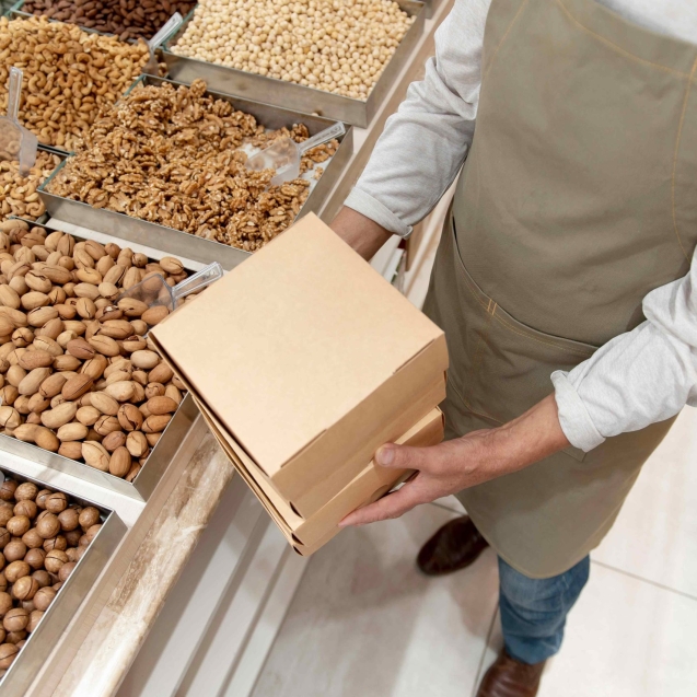 producer-his-shop-with-different-goodies